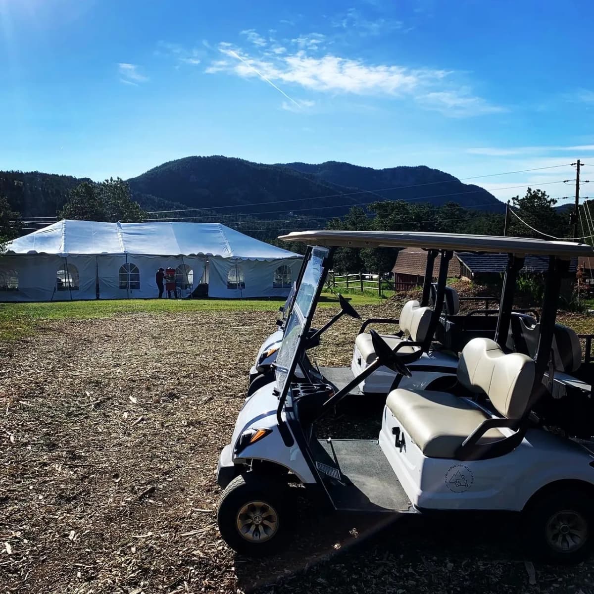 Golf carts at mountain event venue